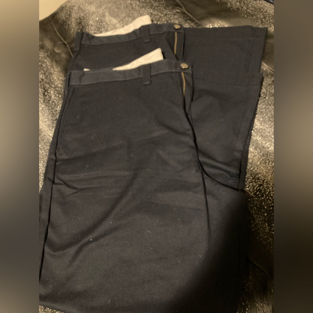 Blue Dickies work pants.